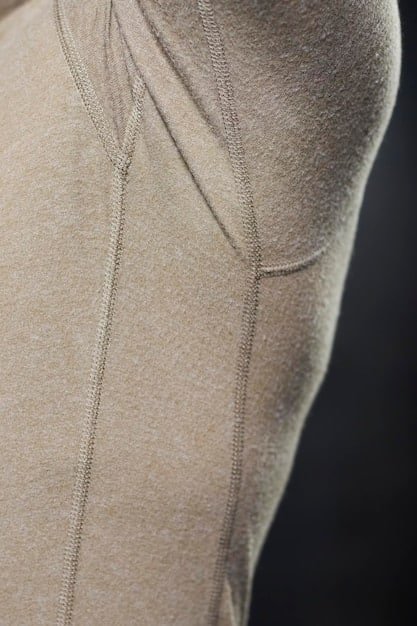 A close-up of different fabric textures commonly used in Shein jumpsuits, including stretchy spandex, breathable cotton, and flowing rayon. The image highlights the distinct drape and feel of each fabric.