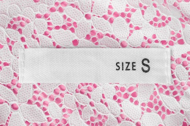 Close-up of a Shein product page showing the size chart with accompanying measurements in both inches and centimeters. Highlight the user ratings and review snippets visible on the page related to sizing feedback.
