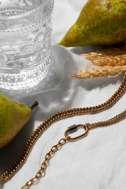 A close-up shot of various Shein accessories, including a clear belt bag, chunky chain necklaces, and colorful hair clips, arranged on a flat surface. The lighting is soft and inviting, highlighting the details of each item.
