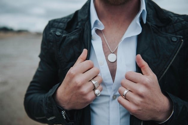 A close-up shot of a well-dressed man showcasing Shein men's fashion. He is wearing a stylish blazer, a dress shirt, and tailored trousers. The setting is a modern office or co-working space, highlighting the fashion-forward and professional appeal of Shein's clothing.